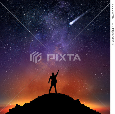 Businessman indicate a falling star 96065367