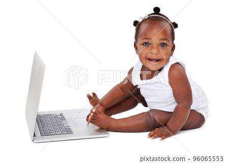The cure for boredom is curiousity. Studio shot of an adorable baby girl using a laptop isolated on white. The cure for boredom is curiousity. Studio shot of an adorable baby girl using a laptop isolated on white. 96065553