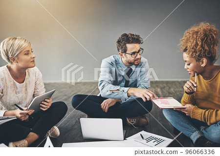 That idea looks great. Shot of a diverse group of creative employees having a meeting inside. That idea looks great. Shot of a diverse group of creative employees having a meeting inside. 96066336