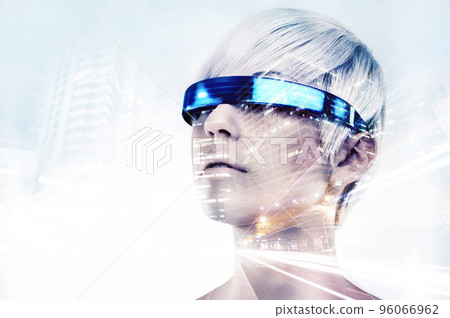 Envisioning the future. Multiple exposure shot of a young woman with VR glasses superimposed on a city at night. Envisioning the future. Multiple exposure shot of a young woman with VR glasses superimposed on a city at night. 96066962