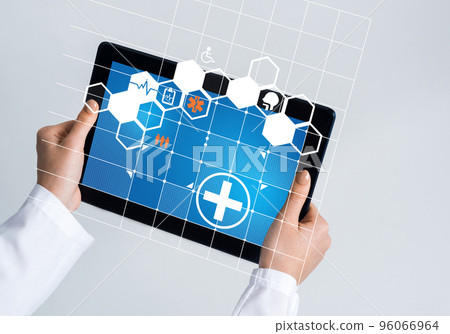 Close of female doctor hands working with tablet pc computer 96066964