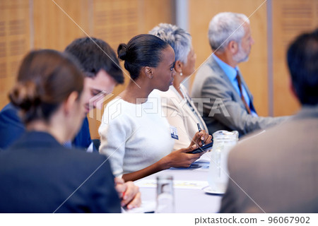 Getting the facts straight. A cropped shot of members of the press at a press conference. Getting the facts straight. A cropped shot of members of the press at a press conference. 96067902