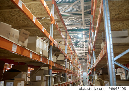 Goods in shipping cartons on the stockhouse shelves 96068408