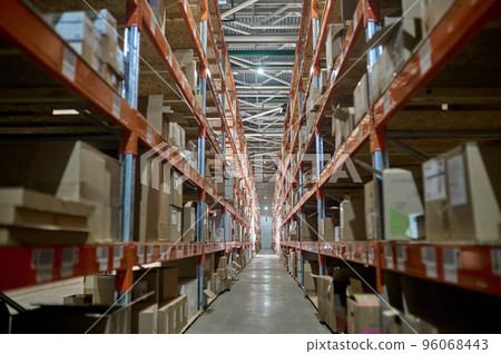 Modern warehouse facility with goods stored on the shelves Modern warehouse facility with goods stored on the shelves 96068443