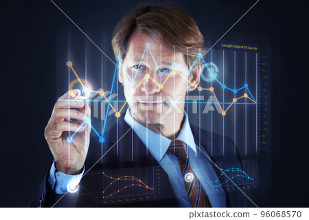 Technology making business easy. Cropped shot of a businessman writing on a hologram chart.All screen content is designed by us and not copyrighted by others, and upon purchase a user license is 96068570