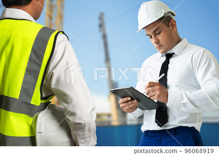 Engineer meeting for architectural project or architecture discussing and working on blueprint with architect equipment, Construction concept. Engineer meeting for architectural project or architecture discussing and working on blueprint with architect equipment, Construction concept. 96068919