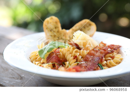 fusilli pasta with bacon italian food 96068958