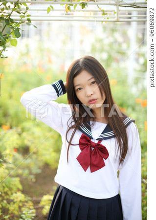school girl costume at park outdoor with flowers garden background 96069872