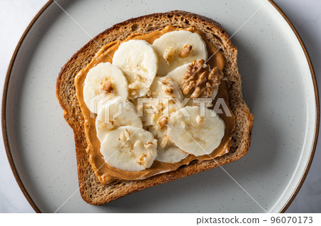 Healthy open sandwich with peanut butter 96070173