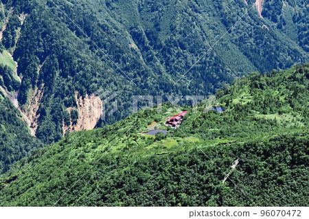Kagamidaira Sanso and Kagamiike Pond seen from the Koike Shindo Road in the Hida Mountains of the Northern Alps 96070472