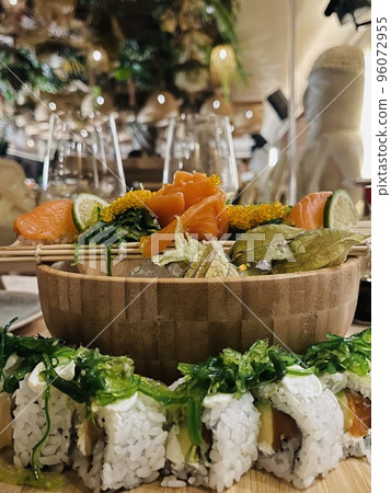 Close up of sushi set. Sushi rolls. Japanese seafood. Food concept. Close up of sushi set. Sushi rolls. Japanese seafood. Food concept. 96072955