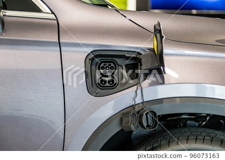 Connector type 2 euro for charging an electric car . Charging plug in under the fuel tank hatch 96073163