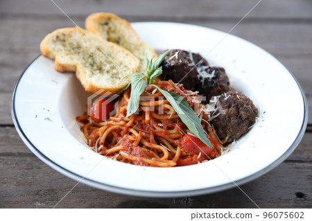 Spaghetti Meatballs on wood background Spaghetti Meatballs on wood background 96075602