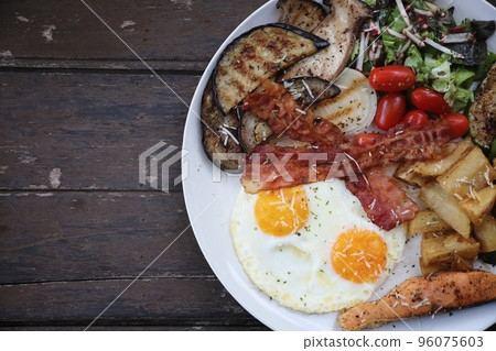 American breakfast with egg bacon sausage and salad American breakfast with egg bacon sausage and salad 96075603