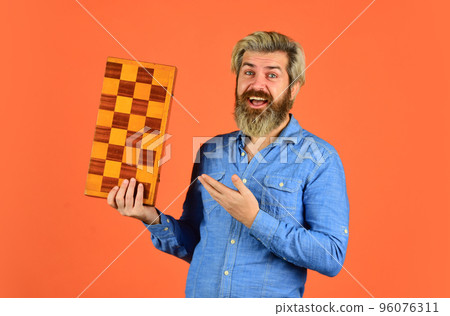 Teacher chess competition. Game strategy concept. Board game. Man playing chess. Intelligent bearded hipster. Cognitive skills. Hobby and leisure. Intellectual games. Chess lesson. Chess figures Teacher chess competition. Game strategy concept. Board game. Man playing chess. Intelligent bearded hipster. Cognitive skills. Hobby and leisure. Intellectual games. Chess lesson. Chess figures 96076311