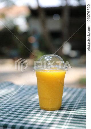 Mango smoothie milk shake with take out glass 96076790