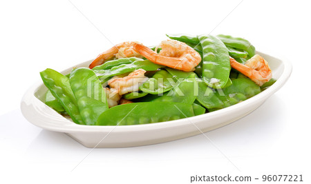 Fried Shrimp With Snow Peas .food in dish high protien on white backgroud. Fried Shrimp With Snow Peas .food in dish high protien on white backgroud. 96077221