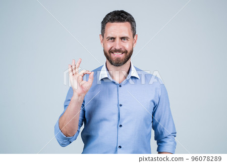 handsome smiling bearded businessman in shirt show ok gesture, success handsome smiling bearded businessman in shirt show ok gesture, success 96078289