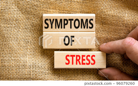 Symptoms of stress symbol. Concept words Symptoms of stress on wooden blocks. Beautiful canvas table canvas background. Doctor hand. Psychological business and Symptoms of stress concept. Copy space. Symptoms of stress symbol. Concept words Symptoms of stress on wooden blocks. Beautiful canvas table canvas background. Doctor hand. Psychological business and Symptoms of stress concept. Copy space. 96079260