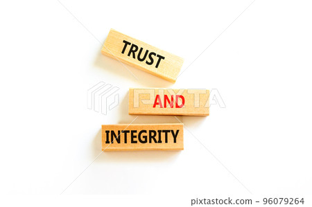 Trust and integrity symbol. Concept words Trust and integrity on wooden blocks. Beautiful white table white background. Business, psychological and trust and integrity concept. Copy space. Trust and integrity symbol. Concept words Trust and integrity on wooden blocks. Beautiful white table white background. Business, psychological and trust and integrity concept. Copy space. 96079264