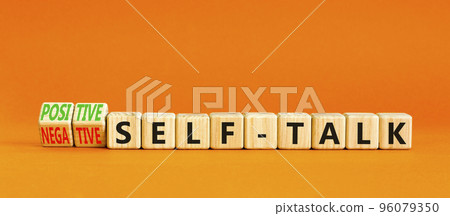 Positive or negative self-talk symbol. Concept words Positive self-talk and Negative self-talk on cubes. Beautiful orange background. Psychological positive or negative self-talk concept. Copy space. 96079350