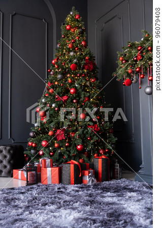 Christmas New Year tree with gifts in the room Christmas New Year tree with gifts in the room 96079408