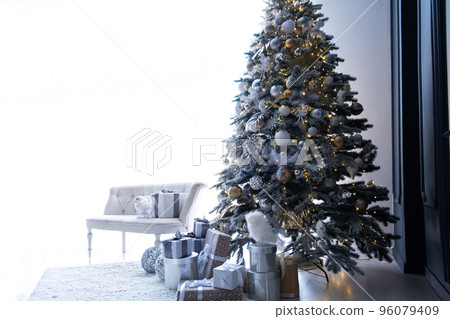 Beautiful Christmas tree indoors with white space for text Beautiful Christmas tree indoors with white space for text 96079409
