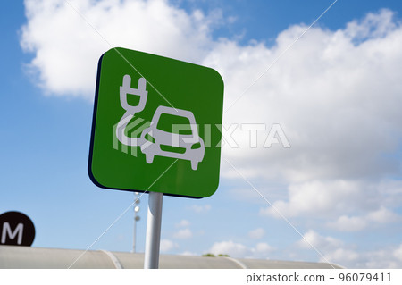Green sign of car electric charging station. Green sign of car electric charging station. 96079411