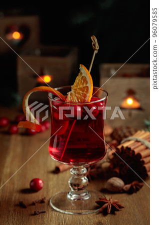 Christmas drink with spices, orange, and cranberries. 96079585