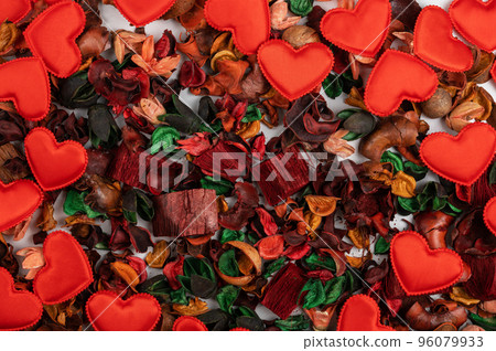 Different dry flowers with red hearts background 96079933