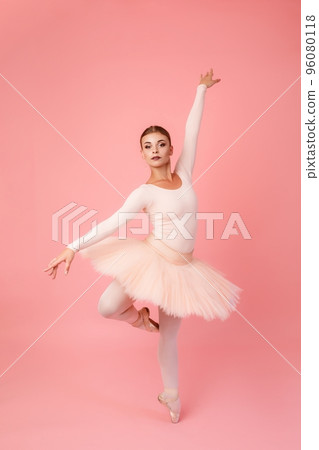 Ballerina dancing in studio 96080118