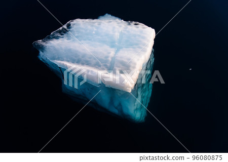 Big piece of ice in sea water Big piece of ice in sea water 96080875