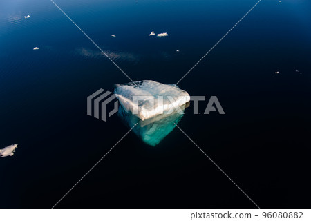 Big piece of ice in sea water    96080882