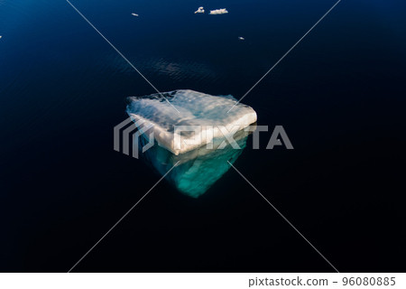 Big piece of ice in sea water Big piece of ice in sea water 96080885