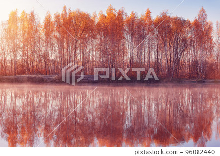 Fog above the lake at cold morning. 96082440