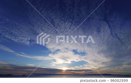 Refreshing autumn coastal evening view with cirrocumulus clouds, super wide angle, mainly sky, 221021pm Refreshing autumn coastal evening view with cirrocumulus clouds, super wide angle, mainly sky, 221021pm 96082899