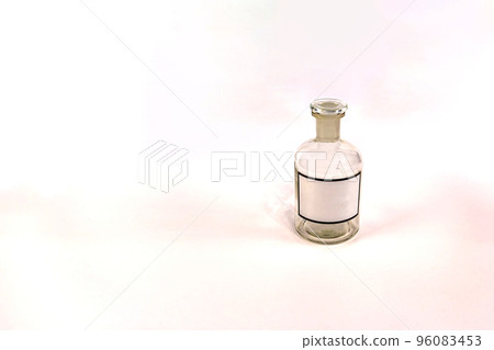 Transparent medical jar with a glass stopper on a white background Transparent medical jar with a glass stopper on a white background 96083453