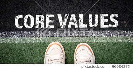 Core Values concept. Starting line and white sneakers 96084275