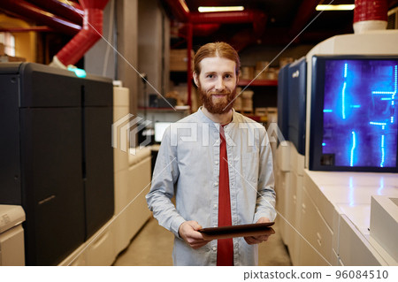 Smiling Worker in Printing Shop 96084510