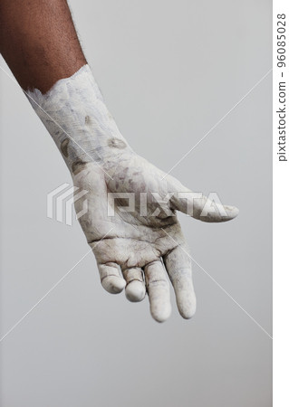 Hand covered in white paint minimal 96085028