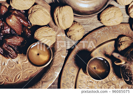 Date Fruit on Red Striped Cloth. Iftar Food Mostly Eating in Ramadan. 96085075