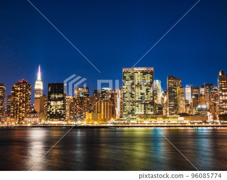 New York East River and Manhattan skyscrapers night view New York East River and Manhattan skyscrapers night view 96085774