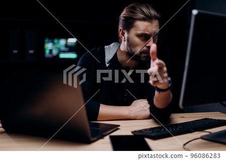 Cyber terrorist with computers at room Cyber terrorist with computers at room 96086283