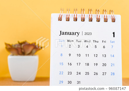 Close up the Janaury 2023 Monthly desk calendar for 2023 year on yellow background. 96087147