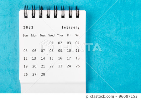 The February 2023 Monthly desk calendar for 2023 year on blue background. 96087152