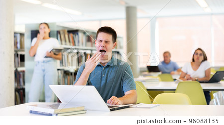 View on bored young male student 96088135