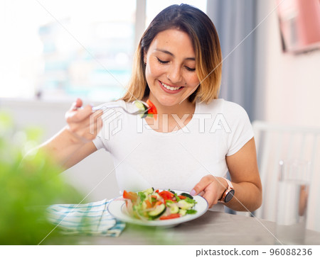Young woman have lunch at home eating freshness salad 96088236