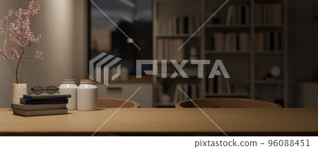Wood dining table with copy space over blurred living room in the background Wood dining table with copy space over blurred living room in the background 96088451
