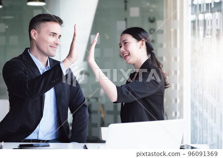 Business Success concept with partner, Partnership Giving Fist Bump after Complete a deal. Successful Teamwork, Businessman with Team Agreement in Corporate 96091369