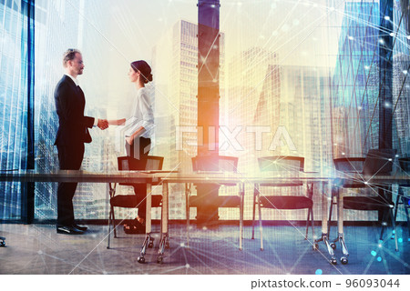 Handshake of two businessperson in office concept of partnership and teamwork 96093044